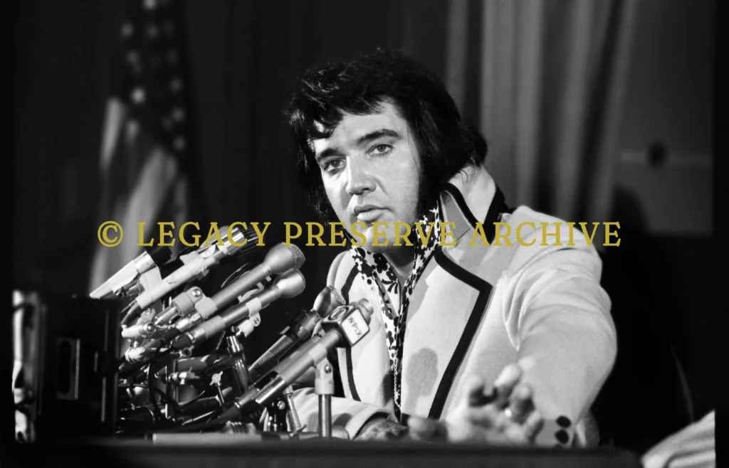 Elvis Presley speaking at a press conference in Manhattan New York City 1972 photographed by David Gahr 35mm film